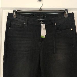 Grey washed Lane Bryant skinny jeans with fringe